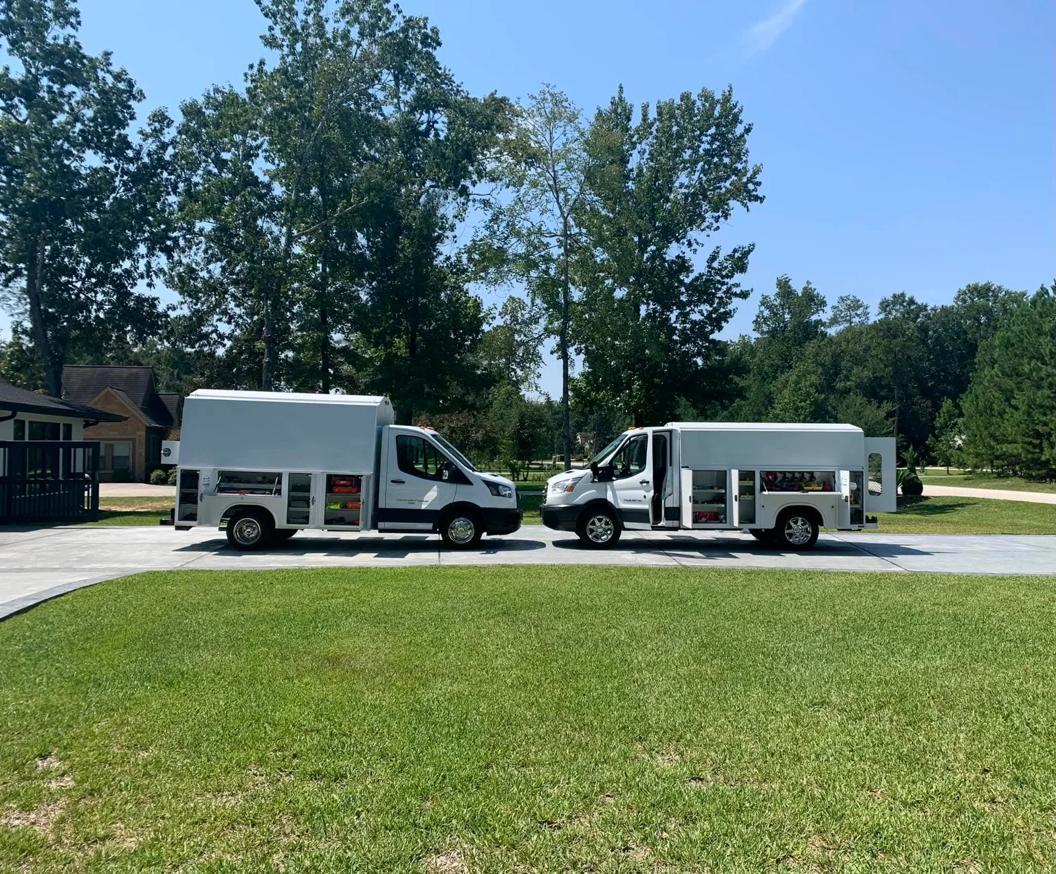KL Electrical Services service trucks
